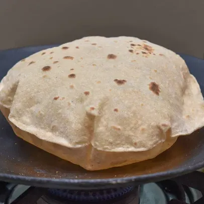 Soft, puffed Phulka Whole Wheat Roti freshly made by Klip2Deal Homefood Hyderabad